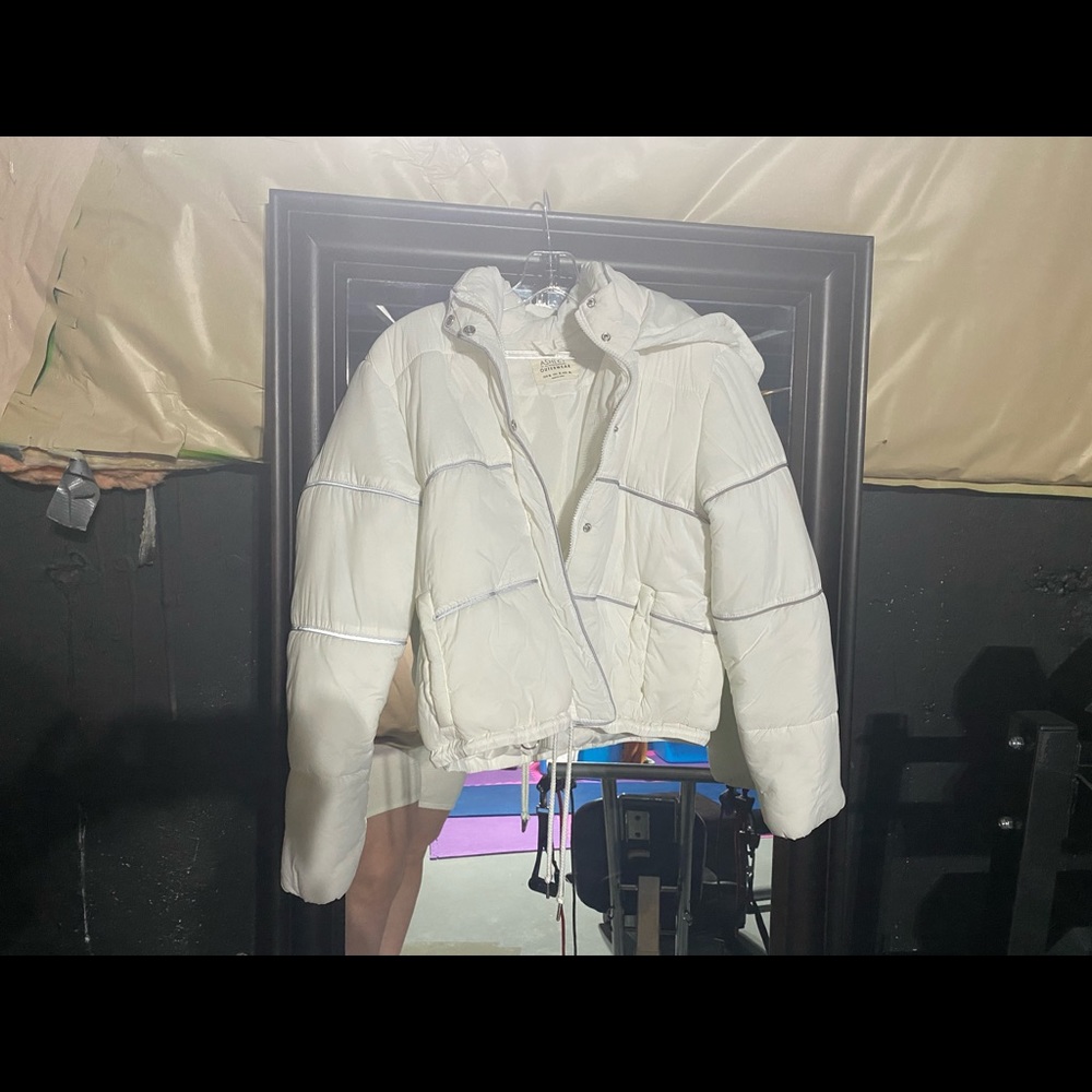 white and reflective puffer jacket